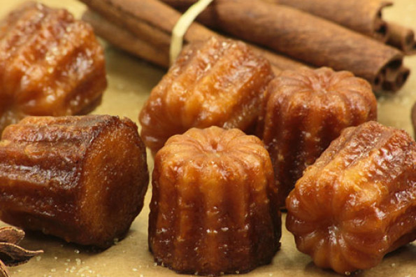 Homemade Cannelé cakes with autumn fruit minestrone